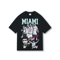 Black oversized basketball-style tee with halftone Scarface print of Tony Montana Miami 305 in vintage 90s bootleg jersey layout.