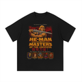 Black oversized streetwear tee with He-Man sword raised plus Masters Of The Universe roster graphic.