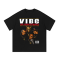 Black oversized streetwear tee with Vibe Magazine Live From Outworld MK trio cover graphic.
