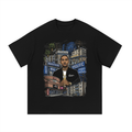 Black oversized streetwear tee with Nipsey Hussle Marathon Clothing Crenshaw tribute scene graphic.